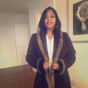 Blue Duck woman’s shearling with mink trim.